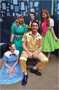  ?? CONTRIBUTE­D PHOTO BY SHEILA HARDING CANNON ?? The Signal Mountain Playhouse production of “Bye Bye Birdie” features Noah Huseman, center, as Conrad Birdie, the rock ‘n’ roll heartthrob about to depart for Army duty. The supporting cast includes, from left, Georgia Sharp (seated), Anna Cate Sparkman, Noah Hawkins and Meredith Johnson.