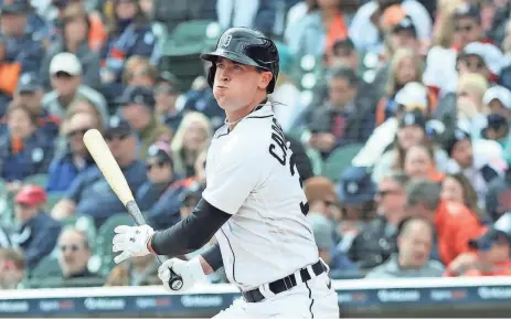  ?? KIRTHMON F. DOZIER/DETROIT FREE PRESS ?? Tigers left fielder Kerry Carpenter doubles against Red Sox pitcher Ryan Brasier during the eighth inning of the Tigers' 6-3 loss on April 6 at Comerica Park.