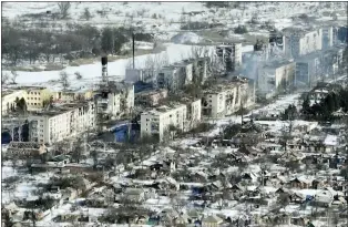  ?? THE ASSOCIATED PRESS ?? Drone footage of Bakhmut on Feb. 13. The longest battle of the yearlong Russian invasion has turned the city of salt and gypsum mines in eastern Ukraine into a ghost town.