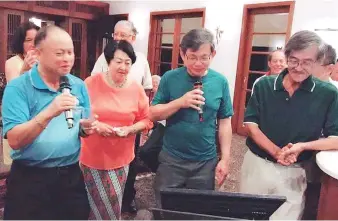  ?? ?? Photo taken during the columnist’s reunion party in Kuching back in 2020 shows (from left) Datuk James Chan, Datin Mary Goh, Joseph Kho and Bujang Dahlan Abon during a karaoke session.