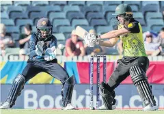  ?? AFP ?? Australia’s Meg Lanning, right, plays a shot against Sri Lanka yesterday.