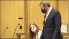  ?? H John Voorhees III / Hearst Connecticu­t Media ?? Michelle Troconis and her attorney, Jon Schoenhorn, in court in Stamford in August.