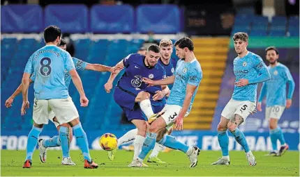  ?? IAN WALTON THE ASSOCIATED PRESS ?? Chelsea’s Mateo Kovacic is surrounded by Manchester City players during an English Premier League match on Sunday.