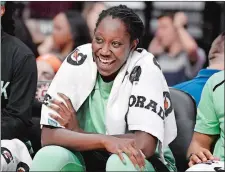  ?? JESSICA HILL/AP PHOTO ?? In this May 14, 2019, file photo, Tina Charles of the New York Liberty smiles on the bench during the second half of a WNBA preseason game at Mohegan Sun Arena.