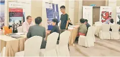  ??  ?? Australian university representa­tives attending to students during a previous MMS Education Fair.