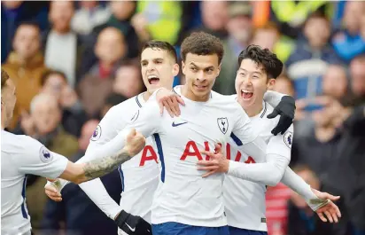  ??  ?? Alli celebrates his first goal of against Chelsea as Tottenham managed to end a 28-year wait for a win at Stamford Bridge yesterday