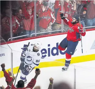  ?? ROB CARR/GETTY IMAGES ?? Washington Capitals forward Devante Smith-Pelly celebrates his third-period goal against Nikita Kucherov’s Tampa Bay Lightning in Game 6 of the Eastern Conference final on Monday night.