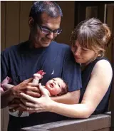  ??  ?? Moving: Paul with Lucy and baby Cady