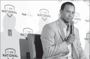  ?? By Patrick Semansky, AP ?? Becoming a rare sight: Tiger Woods appeared at a May 21 news conference in advance of his AT&T National next month, but he has taken to avoiding news media in favor of online chats with fans.