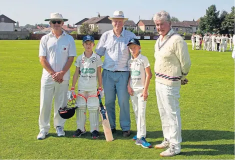  ??  ?? Three generation­s of Mr Dickson’s family took part in the special cricket match. From left: Rick Harrison, Thomas Harrison, David Conran Smith, Hamish Morrison and Andrew Greaves.
