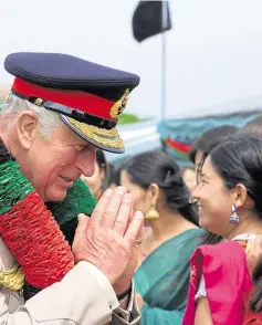  ??  ?? and Prince Charles greets Gurkhas in Folkestone