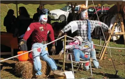  ?? FILE PHOTO — DIGITAL FIRST MEDIA ?? Some scarecrows hanging out at the Hay Creek Apple Festival.