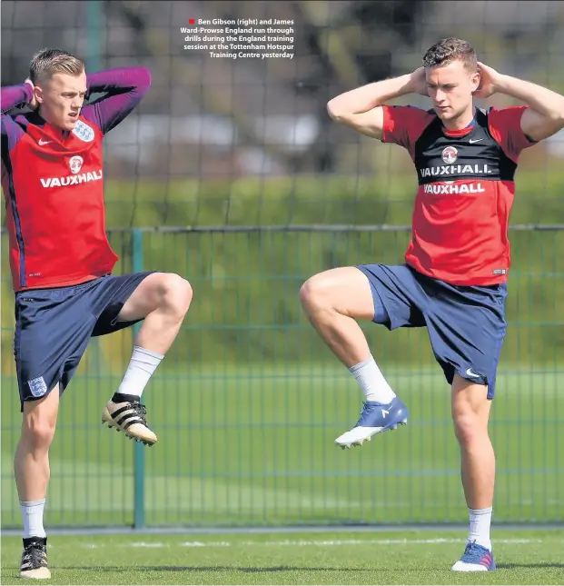  ??  ?? Ben Gibson (right) and James Ward-Prowse England run through drills during the England training session at the Tottenham Hotspur Training Centre yesterday