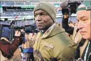  ?? Seth Wenig / Associated Press ?? Jets head coach Todd Bowles walks off the field after Sunday’s loss to the Bills.