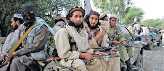  ??  ?? The file photo shows Taliban terrorists in Afghanista­n.