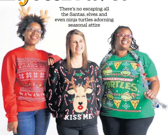  ?? AMY DAVIS/ BALTIMORE SUN ?? From left, Dia Hancock of Mitchellvi­lle, Jennifer Eisenberg of Baltimore and Keisha Jones of Mitchellvi­lle show off the ugly Christmas sweaters they have collected in recent years.