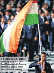  ??  ?? P V Sindhu during the opening ceremony of the 2018 Gold Coast Commonweal­th Games at the Carrara Stadium on the Gold Coast on Wednesday.