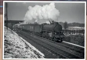  ??  ?? An unidentifi­ed B1 4-6-0 passes under Wood Lane overbridge at Louth in the 1950s with a service to Peterborou­gh, or possibly King’s Cross.