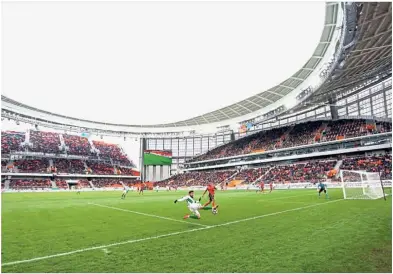  ??  ?? Passing the test: A picture of Russia’s inside-out World Cup arena. — AFP
