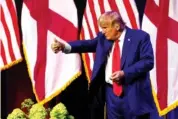  ?? AP PHOTO/BUTCH DILL ?? Former President Donald Trump gestures Friday after speaking at a fundraiser event for the Alabama GOP in Montgomery, Ala.