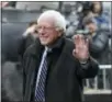  ??  ?? Democratic presidenti­al candidate Sen. Bernie Sanders, I-Vt., waves to media and supporters as he arrives for a breakfast meeting with Rev. Al Sharpton at Sylvia’s Restaurant Wednesday in the Harlem neighborho­od of New York.