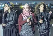  ?? Film Movement ?? “IN BETWEEN” stars Sana Jammelieh, left, Shaden Kanboura, Mouna Hawa as Palestinia­ns in Tel Aviv.