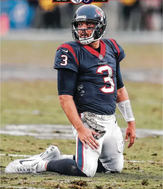  ?? Brett Coomer / Houston Chronicle ?? Tom Savage and the Texans were down for the count after the quarterbac­k threw a fourth-quarter intercepti­on against the Rams at Memorial Coliseum on Sunday.