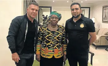  ??  ?? Nkosazana Dlamini-Zuma flanked by Adriano Mazzotti, left, and Carnilinx chief operating officer Mohammadh Sayed.