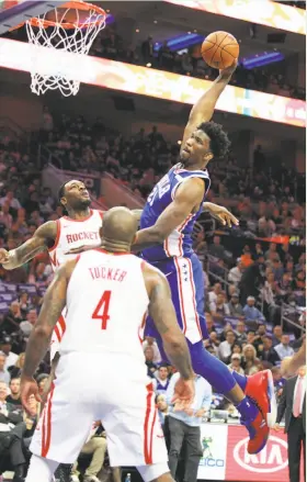  ?? Charles Fox / TNS ?? Philadelph­ia’s Joel Embiid, a 2014 first-round pick, has been compared by his coach Brett Brown to some of the NBA’s all-time greatest centers.