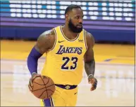  ?? Jeff Chiu / Associated Press ?? LeBron James has become a partner in Fenway Sports Group, making the Los Angeles Lakers star a part-owner of the Boston Red Sox, the Boston Globe reported Tuesday.