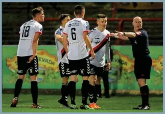  ??  ?? Divisive call: Bohs players surround referee Rob Rogers on Sunday night