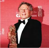  ??  ?? This file photo taken on March 01, 2014 shows FrenchPoli­sh director Roman Polanski posing with his trophy during a photocall after being awarded with the Best Director award for his film ‘La Venus a la Fourrure (Venus in Fur)’ during the 39th edition of the Cesar awards ceremony in Paris on February 28, 2014.