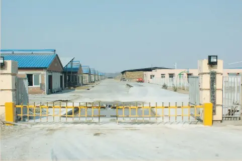  ?? (Jake Spring/Reuters) ?? THE HUISHAN DAIRY farm is seen in Shenyang, China, last week. China Huishan Dairy Holdings Co. Ltd. embraced what its executives called ‘innovative financing’ from the sale and leaseback of its cows to selling wealth-management products for rich...