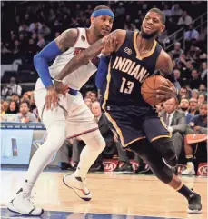  ?? ADAM HUNGER, USA TODAY SPORTS ?? Paul George (13) played with forward Carmelo Anthony in the 2016 Olympics and is excited to have him join Oklahoma City.