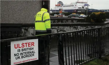  ?? Photograph: Brian Lawless/PA ?? An anti-Brexit sign near the entrance to Larne port, Northern Ireland