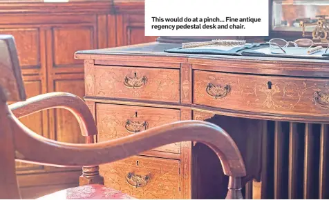  ??  ?? This would do at a pinch... Fine antique regency pedestal desk and chair.