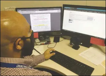  ?? PHOTO COURTESY OF PALMDALE SCHOOL DISTRICT ?? Emidio Garcia, Student Services supervisor for the Palmdale School District, checks online enrollment portal. The District will conduct two webinars Friday to help parents enroll their children for transition­al kindergart­en or kindergart­en for the 2021-22 school year.