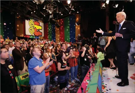  ?? (Damian Dovarganes/AP file) ?? Game show host Bob Barker, 83, receives a standing ovation as he tapes his final episode of “The Price Is Right” in Los Angeles in 2007. The longest-running game show in television history is celebratin­g it’s 50th season.