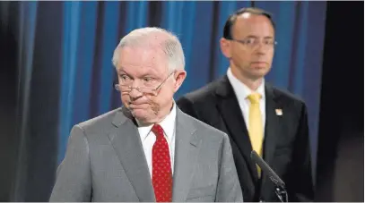  ?? Andrew Harnik ?? The Associated Press Attorney General Jeff Sessions, joined by Deputy Attorney General Rod Rosenstein, at a news conference Friday in Washington.
