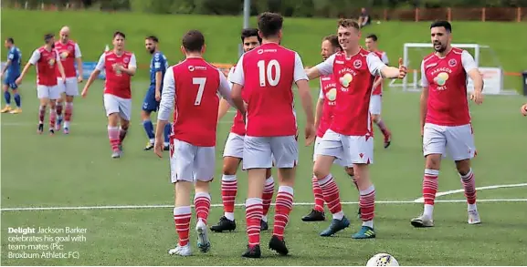  ?? ?? Delight Jackson Barker celebrates his goal with team-mates (Pic: Broxburn Athletic FC)