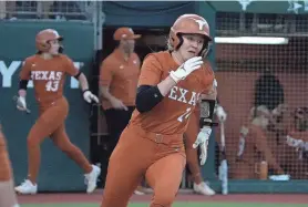  ?? SANCHEZ/AMERICAN-STATESMAN BRIANA ?? Power hitter Reese Atwood has smashed 13 home runs for Texas to come within five of the single-season school record. The Longhorns have 10 regular-season games left before turning their attention to the NCAA postseason.