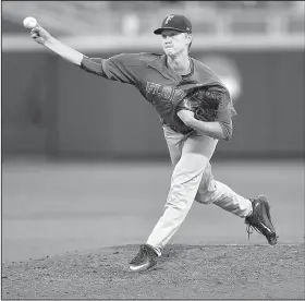  ?? AP/MATT RYERSON ?? Sophomore Brady Singer, Florida’s starter, had a second strong outing in the College World Series in a 4-3 victory over LSU in the first game of the best-of-three series.