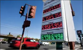  ?? KARL MONDON — STAFF PHOTOGRAPH­ER ?? Gas prices approach the $6 mark Wednesday at a Shell Station in San Carlos. Fuel prices have risen 6.2% since May as Russia and Saudi Arabia have trimmed crude oil production.