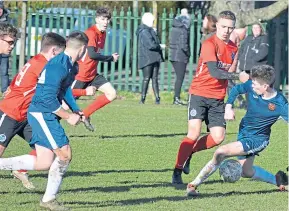  ??  ?? Fairmuir Violet (blue) beat Glenvale on penalties at Graham Street to reach to reach the U/19 Scottish Cup semi-finals.