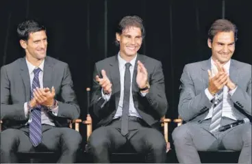  ?? GETTY IMAGES ?? (LR) Novak Djokovic, Rafael Nadal and Roger Federer have won a total of 51 Grand Slam men’s singles titles together.