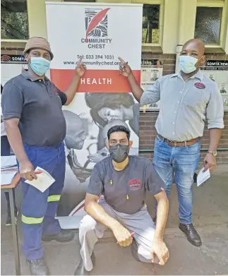  ?? ?? Employees of Somta Tools (Pty) Ltd Andile Bungane, Feroz Subreathee and Vumile Ninele are proud to show their support for Community Chest.