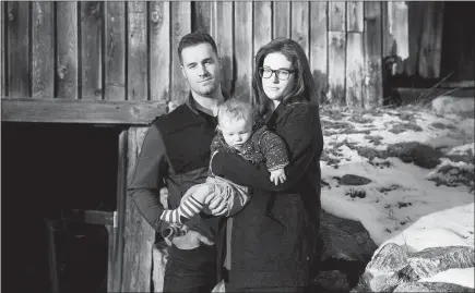  ??  ?? Meanwhile, couples like Gwen and Matt Hurd, pictured with their son Harry at home in Merrimack, N.H., pay full price for Affordable Care Act coverage, which has gotten so expensive they have considered forgoing health insurance.