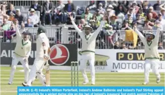  ?? —AFP ?? DUBLIN: (L-R) Ireland’s William Porterfiel­d, Ireland’s Andrew Balbirnie and Ireland’s Paul Stirling appeal unsuccessf­ully for a wicket during play on day two of Ireland’s inaugural Test match against Pakistan at Malahide cricket club, in Dublin on May...