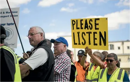  ?? PHOTO: GEORGE HEARD/STUFF ?? Lyttelton port workers at a protest over wages and rosters outside the Christchur­ch City Council building last week.