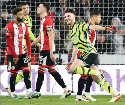  ?? ?? Declan Rice wheels away to celebrate after scoring the fifth goal of the evening for Arsenal last night